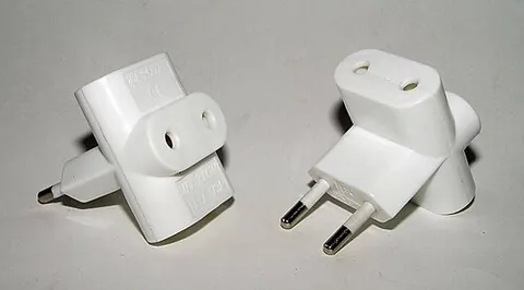 multiplug: an electric device that allows more than one plug to connect to a single socket by containing...