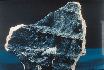 murdochite: an isometric-hexoctahedral black mineral containing bromine, chlorine, copper, lead, and oxygen