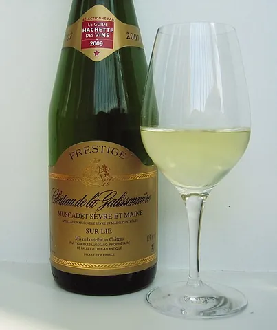muscadet: a white grape grown chiefly in the Loire valley of France, or a dry white wine made from this grape