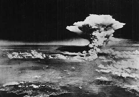 mushroom cloud: a large cloud of smoke, flame and debris that rises into the sky as a result of a large explosion,...