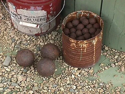 musket ball: a spherical projectile suitable for firing from a musket