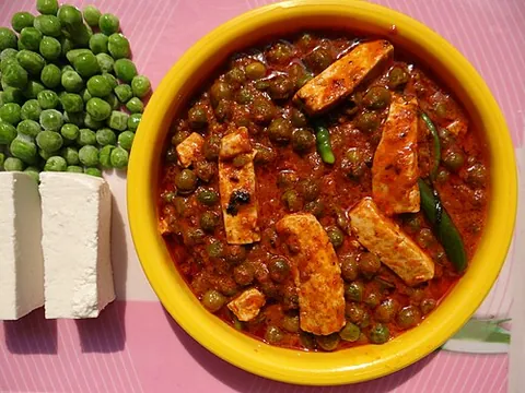 mutter paneer: an Indian dish of peas and soft, immature cheese