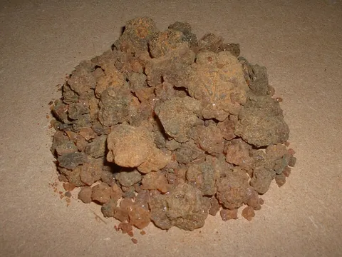 myrrh: a red-brown resinous material, the dried sap of a tree of the genus Commiphora, especially...