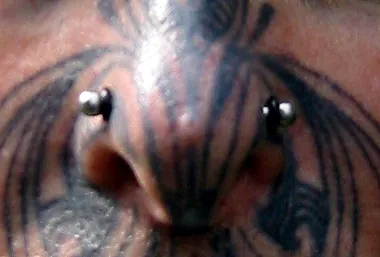 nasallang: a piercing that passes through both sides of the nose and the nasal septum
