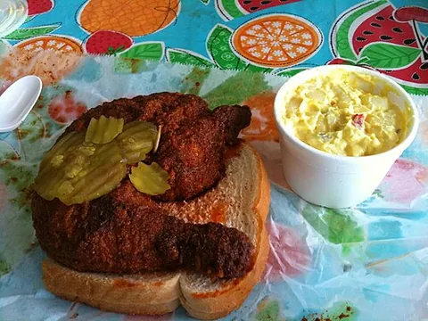 nashville hot chicken: a type of fried chicken from Nashville, Tennessee, which is breaded in a spicy paste and served...