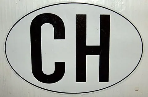 nationality sign: an oval sign attached to the back of a road vehicle to show the nationality of the vehicle