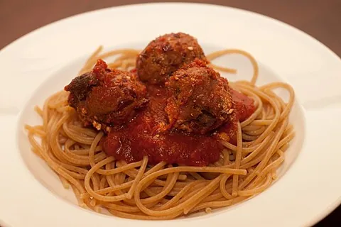 neatball: a vegetarian food made from grains, legumes, or vegetables, meant as a substitute for meatballs