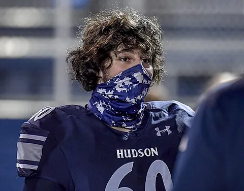 neck gaiter: a type of neckwarmer that can easily be pulled over the mouth and nose to offer a degree of masking...