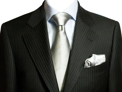 necktie: a strip of cloth worn around the neck and tied in the front