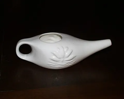 neti pot: a pot or jug used to perform nasal irrigation