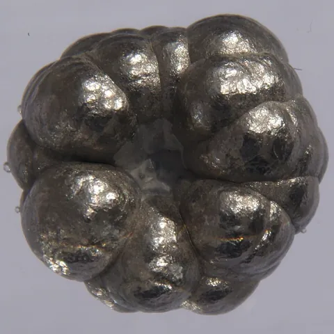 nickel: a silvery elemental metal with an atomic number of 28 and symbol Ni