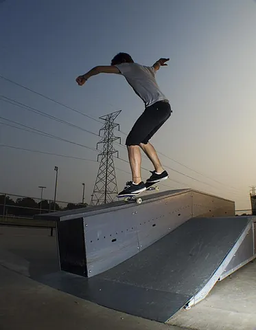 nosegrind: a trick where the skater grinds with only the front truck of the board