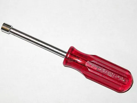 nutdriver: a hand tool for driving nuts and bolts; similar to a screwdriver but with a different tip, usually...