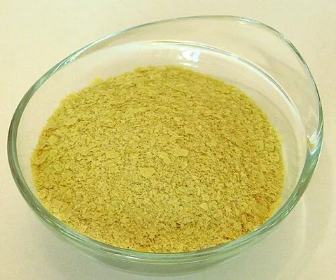 nutritional yeast: a pale yellow preparation of the yeast Saccharomyces cerevisiae, often used as a nutritional...