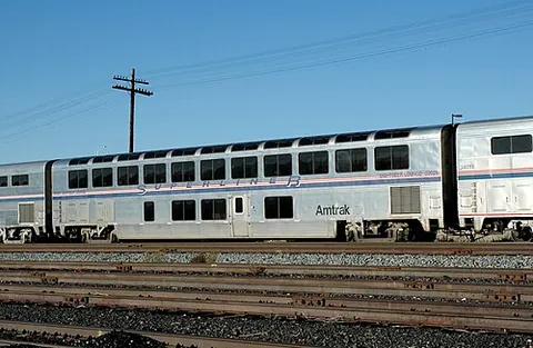 observation car: a railway passenger car made so as to facilitate seeing the scenery en route, sometimes with glass...