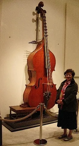 octobass: a very large bass requiring two musicians, one to finger and one to bow
