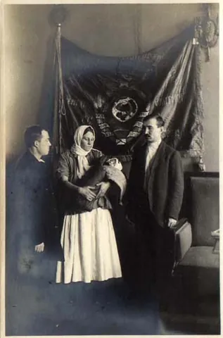 octobering: a naming ceremony in the early Soviet Union meant to serve as an irreligious and Marxist...