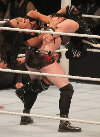 octopus hold: a hold in which the wrestler stands behind the opponent and hooks a leg over the opponent's...