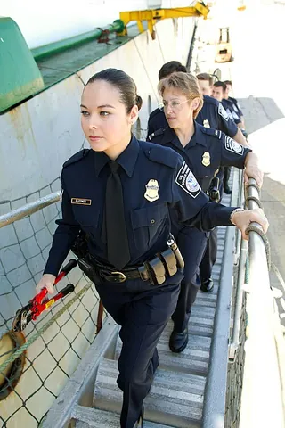 officer: one who has a position of authority in a hierarchical organization, especially in military, police...