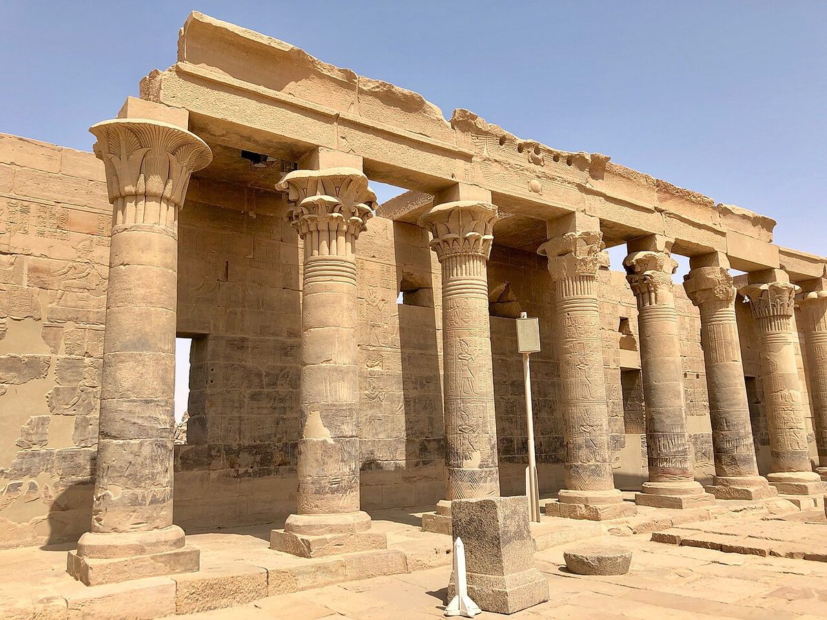 column: a solid upright structure designed usually to support a larger structure above it, such as a roof...