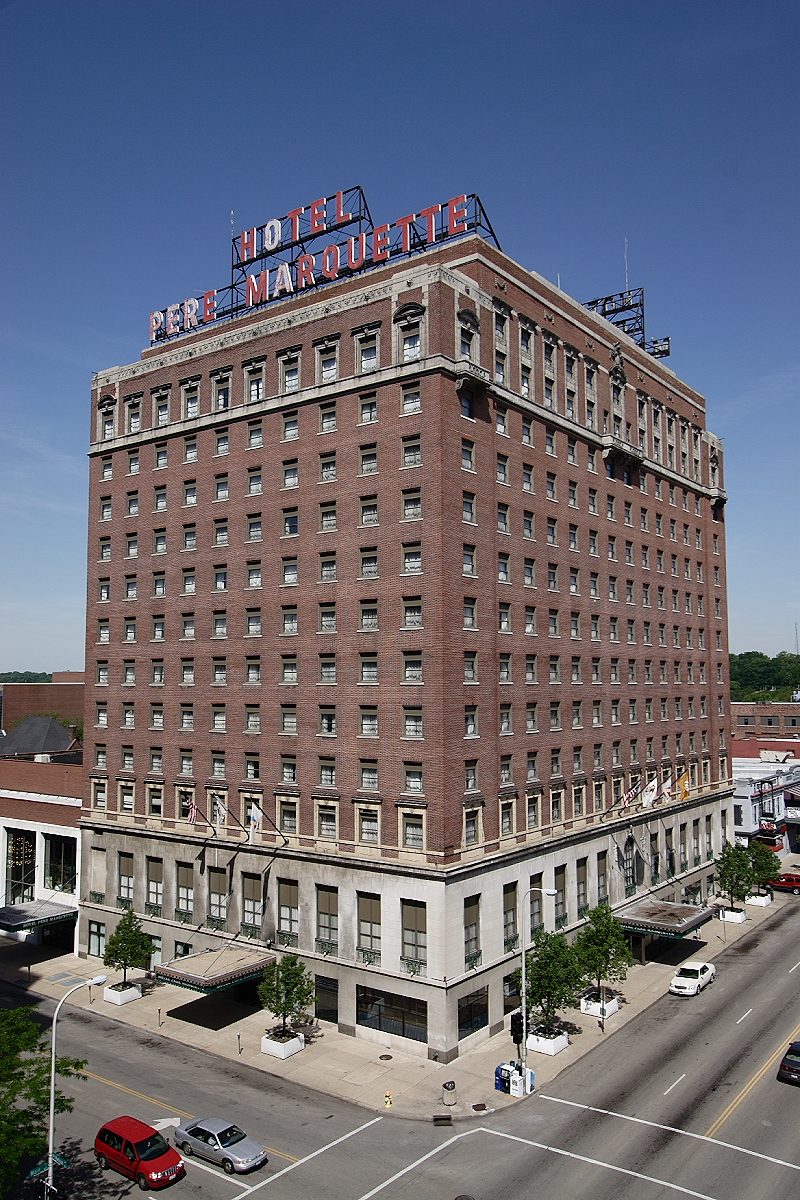 hotel: a large town house or mansion; a grand private residence, especially in France