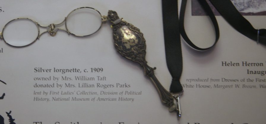 lorgnette: an opera glass with a handle