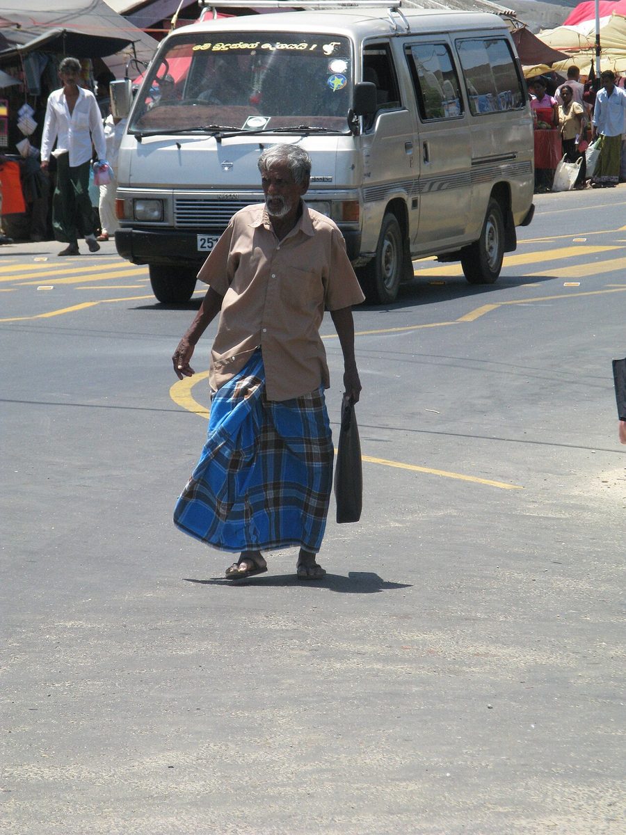 sarong: a garment made of a length of printed cloth wrapped about the waist that is commonly worn by men...
