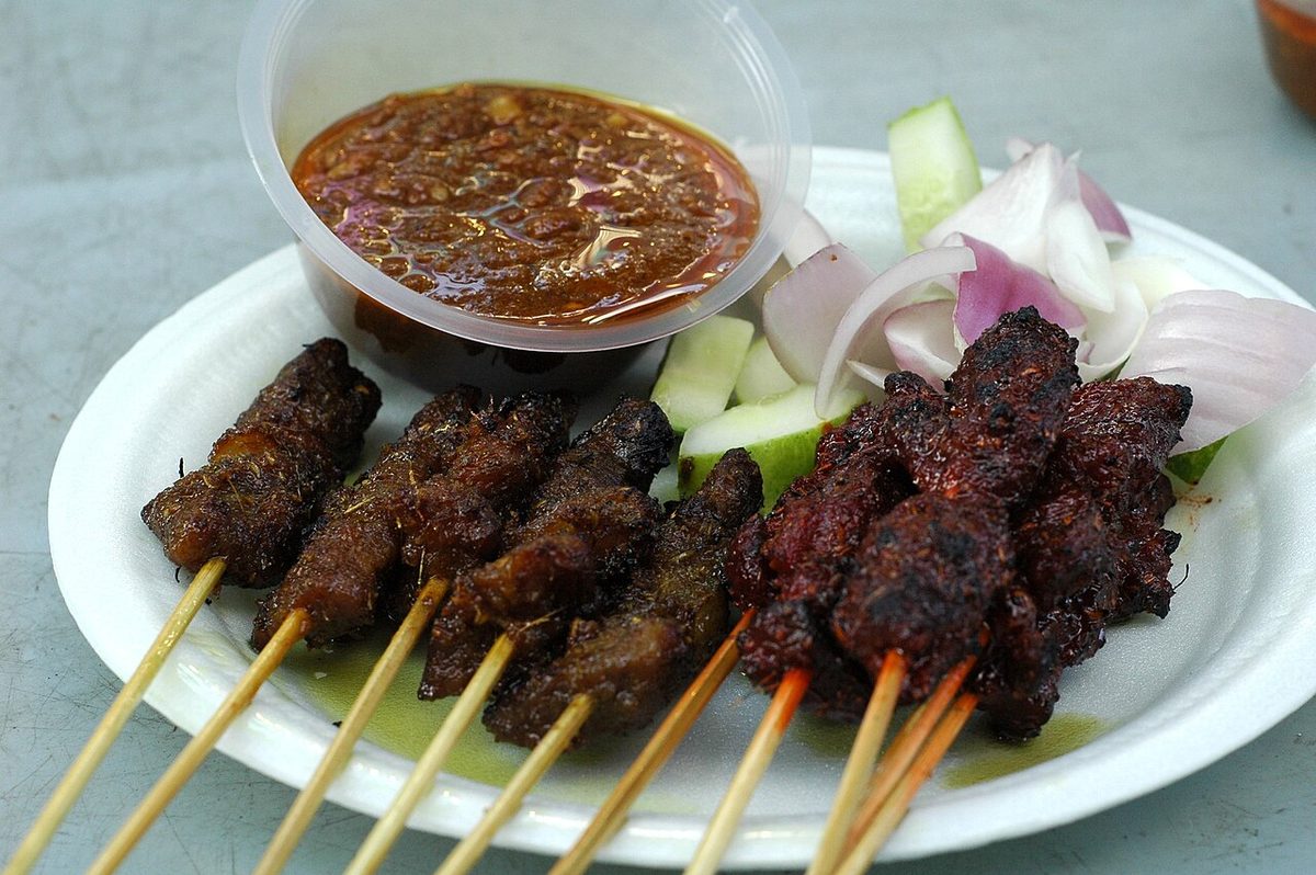 satay: a dish made from small pieces of meat or fish grilled on a skewer and served with a spicy peanut...
