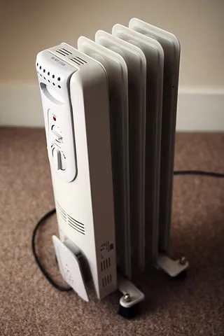 oil heater: a portable electric heater that uses oil as a heat conductor to provide consistent warmth, or a...