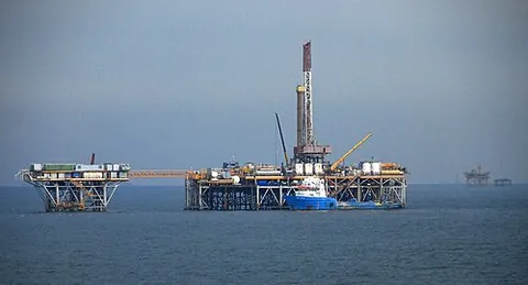 oil platform: a large structure used to house workers and machinery needed to drill and then produce oil and...