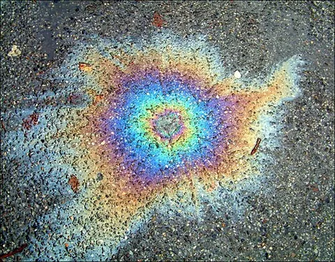 oil spot: a soiled spot on clothing, a tablecloth, etc., where some oil was absorbed; a similar spot on a...