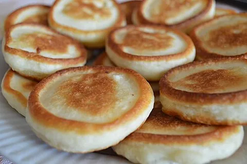 oladyi: small thick pancakes or fritters common in Russian and Ukrainian cuisines