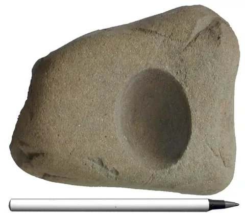 omar: a glacial erratic piece of (typically smooth) dark siliceous greywacke that exhibits a...