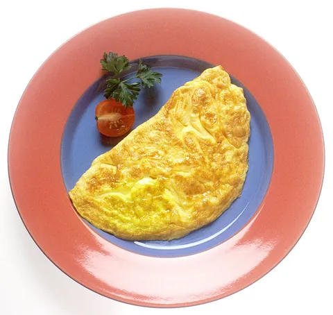 omelette: a dish made with beaten eggs cooked in a frying pan without stirring, flipped over to cook on both...