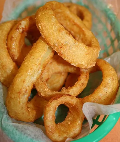 onion ring: a ring-shaped piece of onion formed from a way of cutting through the natural shell structure of...