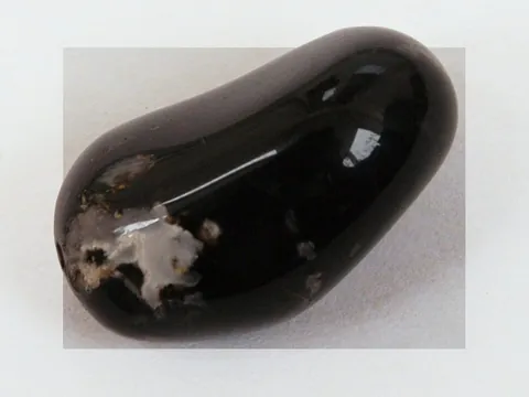 onyx: a banded variety of chalcedony, a cryptocrystalline form of quartz