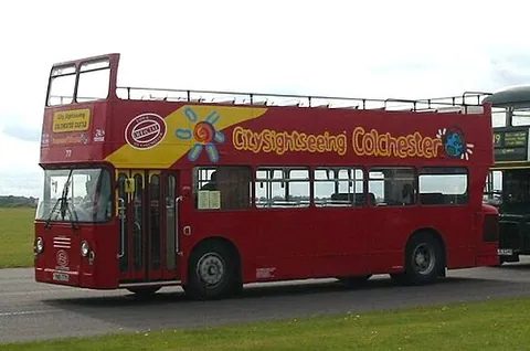 open-topper: a double-deck bus with an open, or partially open, top deck
