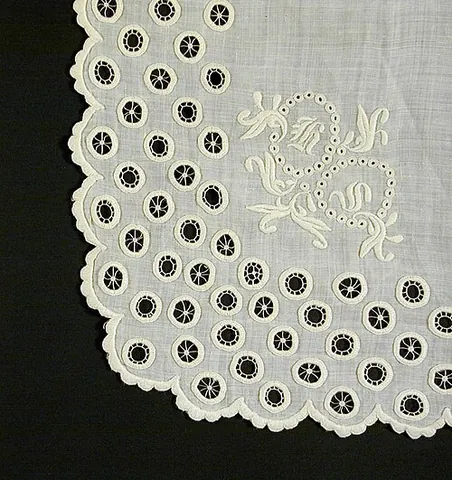 openwork: any of several forms of metalwork or needlework having decorative openings