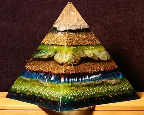 orgonite: a mixture of fiberglass resin, metal shavings, quartz, etc., supposed to convert negative energy...