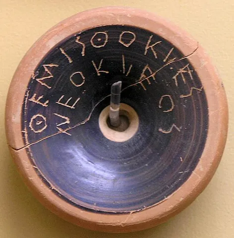 ostracon: a piece of pottery or stone, usually broken off from a vase or other earthenware vessel, especially...