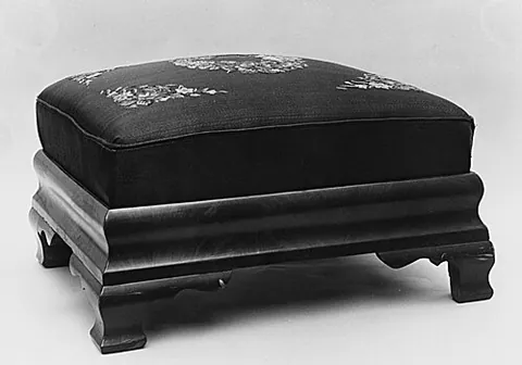 ottoman: an upholstered sofa, without arms or a back, sometimes with a compartment for storing linen etc