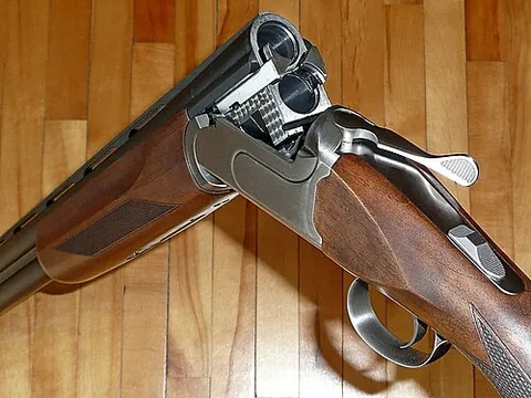 over and under: a double-barreled shotgun (or infrequently a rifle), with one barrel placed on top of the other