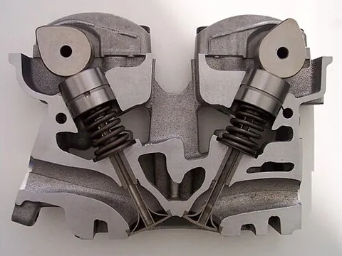 overhead cam: a type of cam (and camshaft) in an internal combustion engine, and thus also (metonymic) the type...