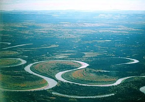 oxbow lake: a crescent-shaped lake formed near a flat-valleyed river when one of its meanders becomes pinched...