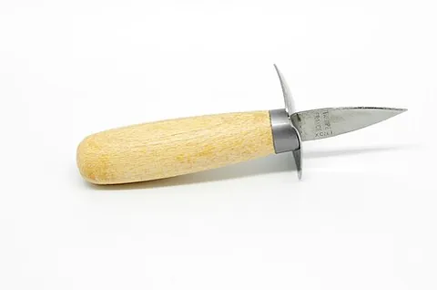 oyster knife: a knife with a short, thick blade, used to pry open oysters and separate the meat from the shell