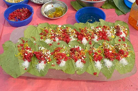 paan: a psychoactive preparation of betel leaf combined with areca nut and/or cured tobacco, chewed...