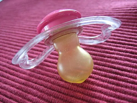 pacifier: someone or something that pacifies