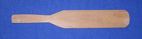 paddle: a single-bladed version is typically used on canoes and some other small boats