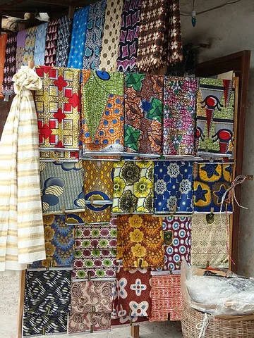 pagne: a length of wax-print fabric made in West Africa, worn as a single wrap or made into other...