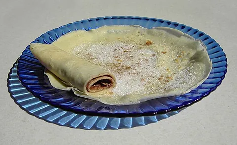 palatschinke: a pancake of a thin crepe-like variety common in the Balkans, Central and Eastern Europe